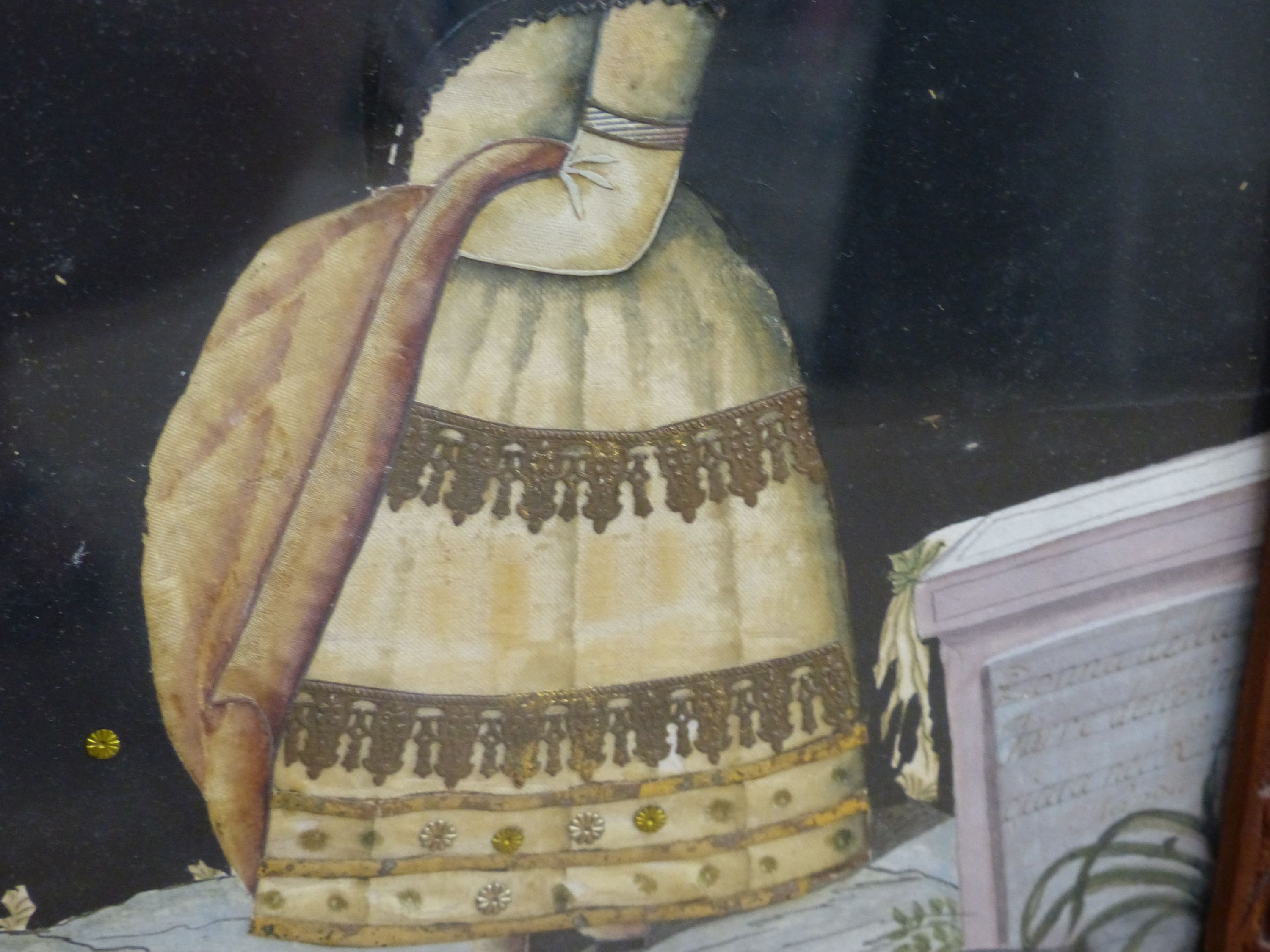 An early 19th century painted silk and gilt metal portrait 24 x 19cm